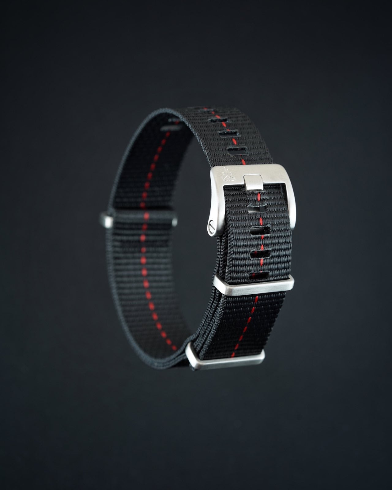 Rugged watch band in black with red stitching detail